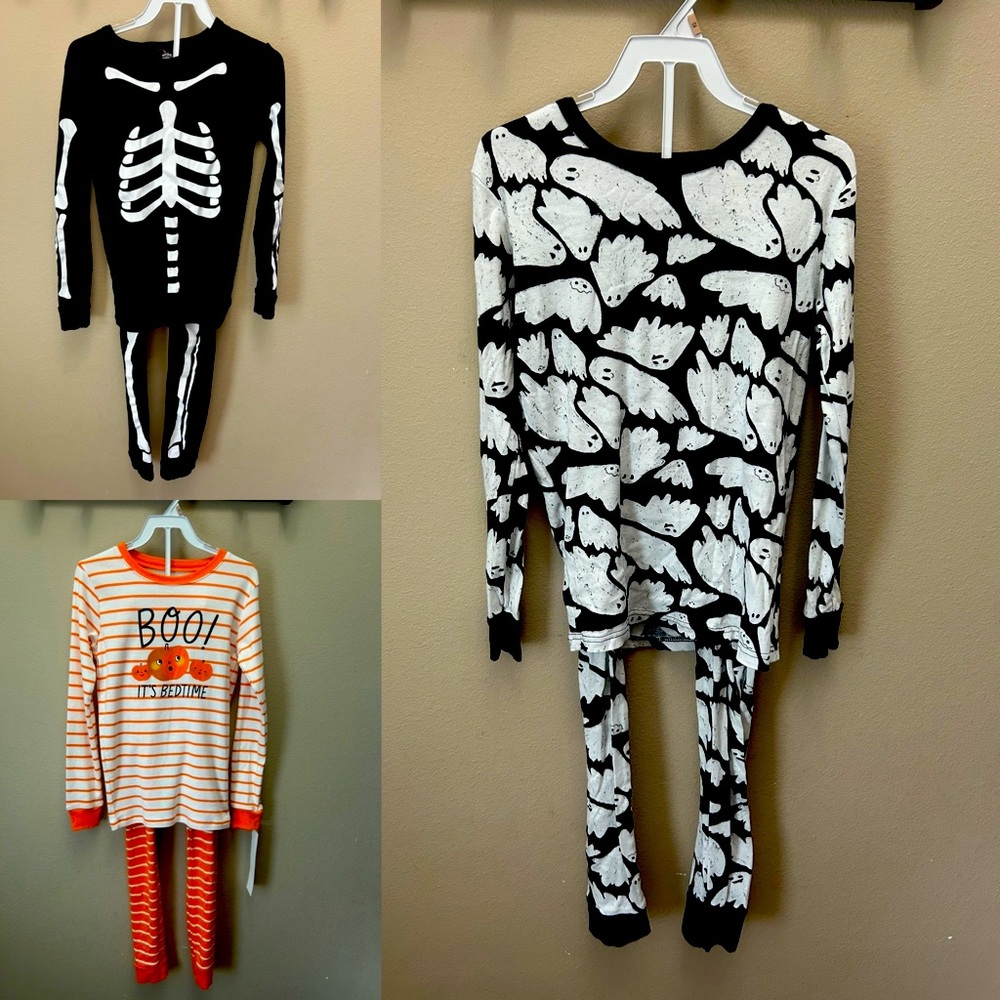 3 Halloween 🎃 👻 pajama sets 2 are a size 12 and 1 is a size 14.